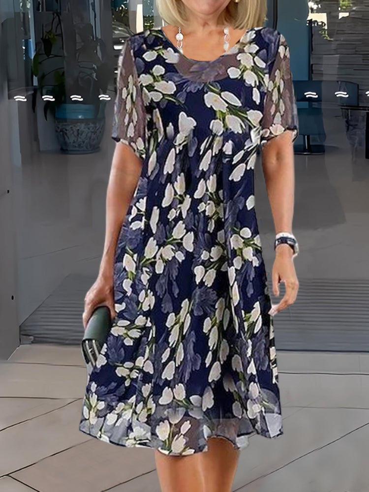 Anastasia | Elegantti Mekko Kaksoistunikalla ja Kukkapainatuksella